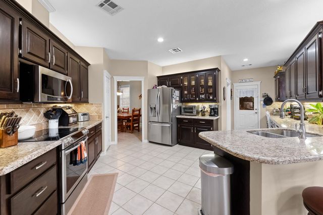 1702 Country Creek Court, Magnolia, TX 77354