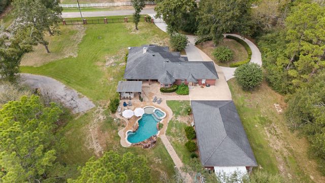 1702 Country Creek Court, Magnolia, TX 77354