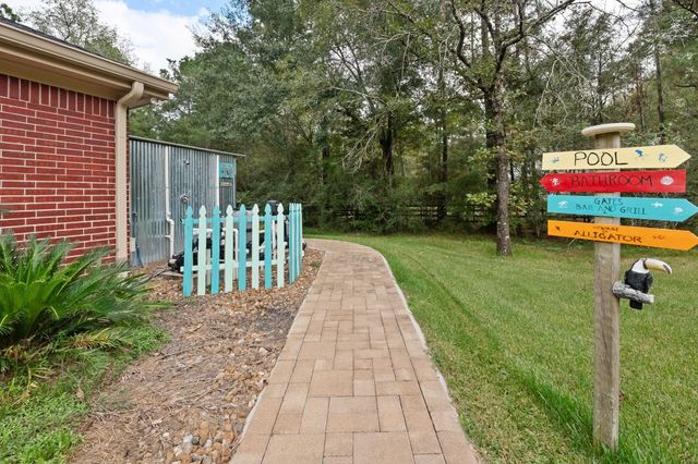 1702 Country Creek Court, Magnolia, TX 77354
