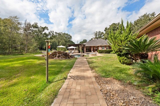 1702 Country Creek Court, Magnolia, TX 77354