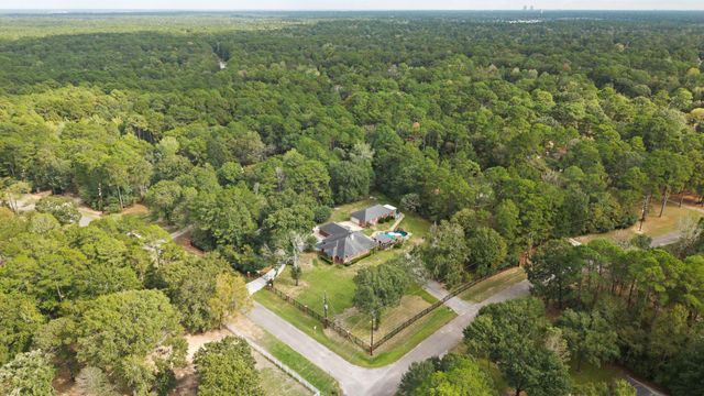 1702 Country Creek Court, Magnolia, TX 77354