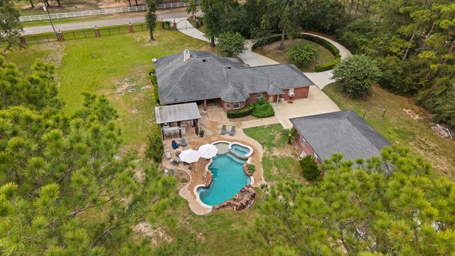1702 Country Creek Court, Magnolia, TX 77354