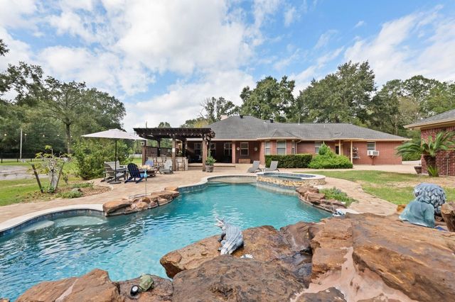 1702 Country Creek Court, Magnolia, TX 77354