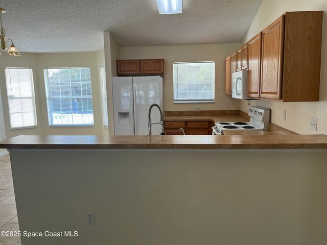 911 Le Baron Street SW, Palm Bay, FL 32908