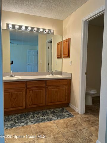 911 Le Baron Street SW, Palm Bay, FL 32908