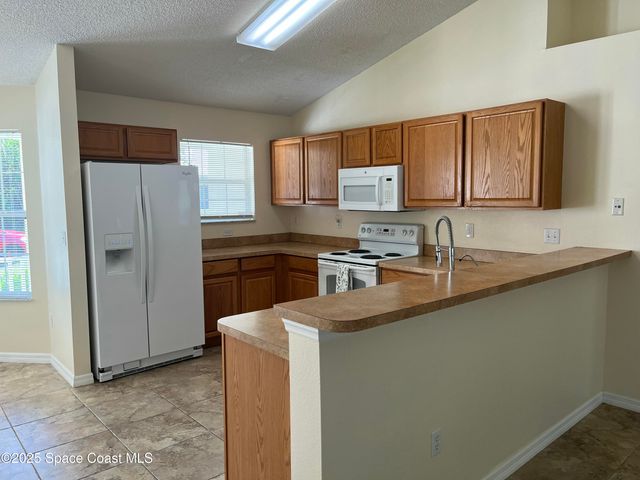 911 Le Baron Street SW, Palm Bay, FL 32908