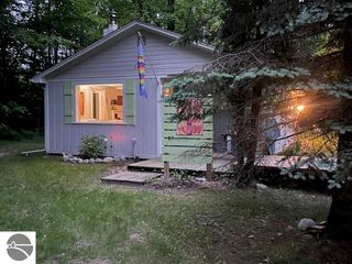 12851 Manitou Trail, Kewadin, MI 49648