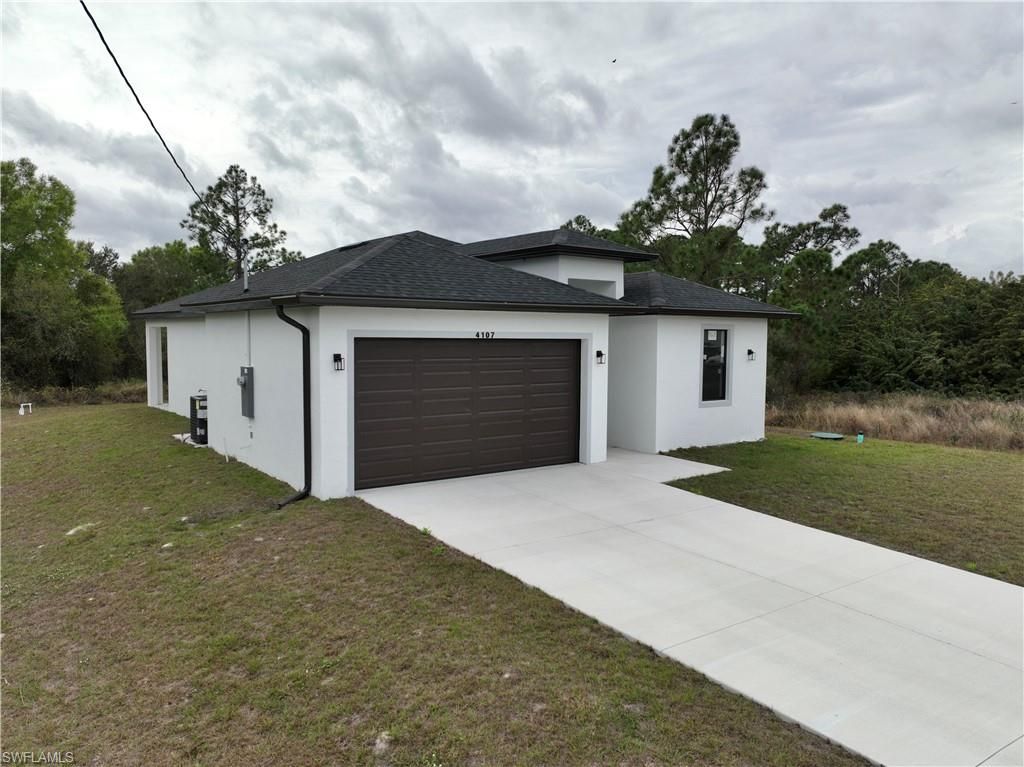 4107 13th ST SW, LEHIGH ACRES, FL 33976 — exterior