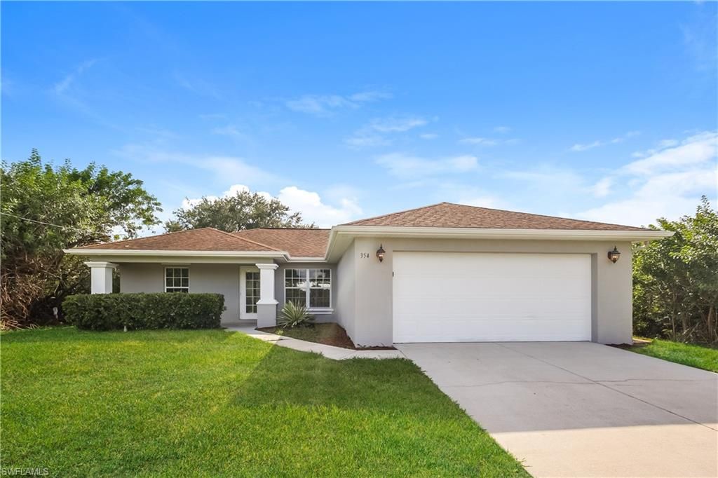 354 Pauline AVE, LEHIGH ACRES, FL 33974 — exterior