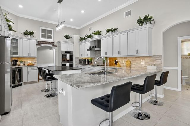 1488 Lantana Ct, Weston, FL 33326