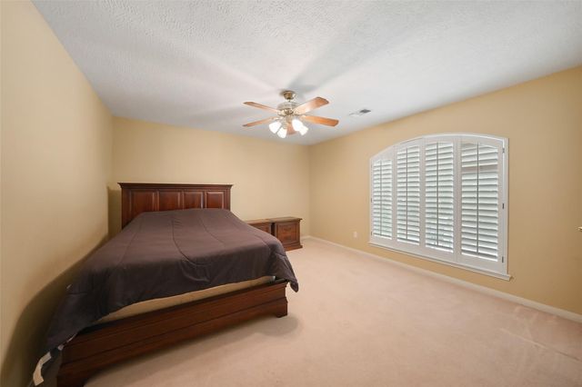 49 N Greenvine Circle, The Woodlands, TX 77382