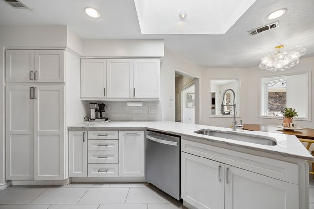9026 Woodhurst Drive, Dallas, TX 75243