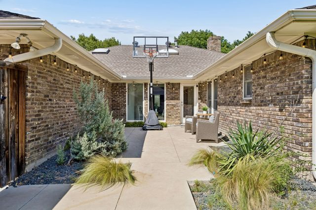 9026 Woodhurst Drive, Dallas, TX 75243
