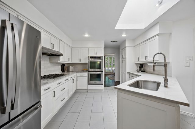 9026 Woodhurst Drive, Dallas, TX 75243