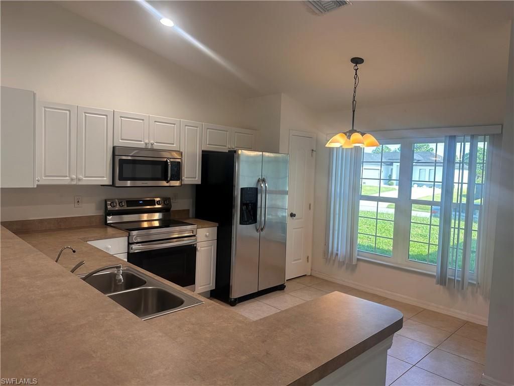 3009 37th ST W, LEHIGH ACRES, FL 33971 — photo 2