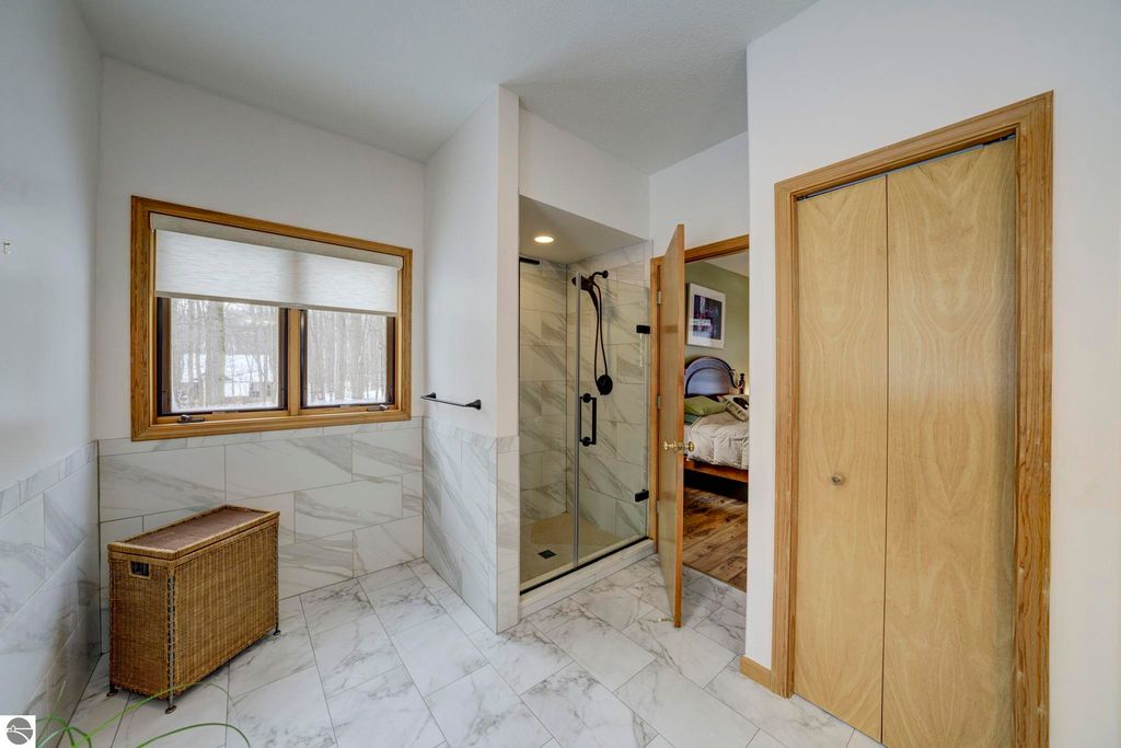 Image 18 of property listing at 4297 Ridge Run, Bellaire, MI 49615