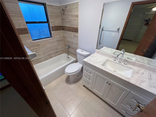 1921 SW Hickock Ter, Port St. Lucie, FL 34953