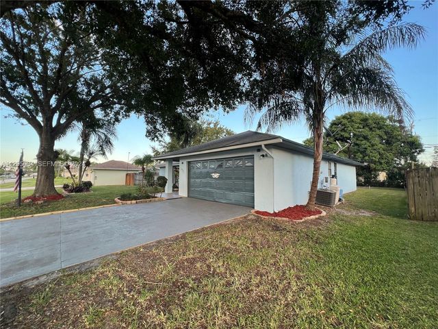 1921 SW Hickock Ter, Port St. Lucie, FL 34953
