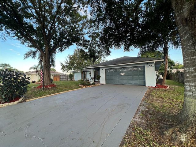1921 SW Hickock Ter, Port St. Lucie, FL 34953
