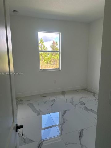 406 Genoa AVE S, Lehigh Acres, FL 33974