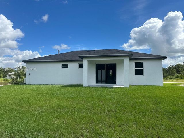 406 Genoa AVE S, Lehigh Acres, FL 33974