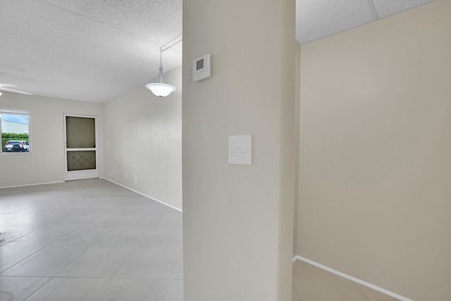 400 VILLAGE GREEN Circle W 105, Palm Springs, FL 33461