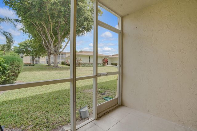 400 VILLAGE GREEN Circle W 105, Palm Springs, FL 33461