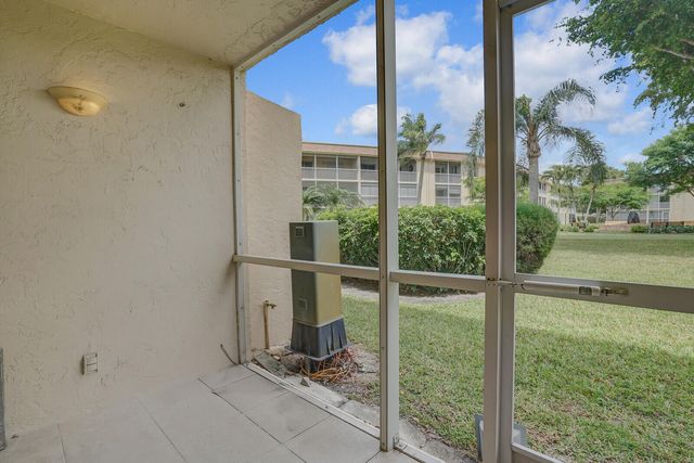 400 VILLAGE GREEN Circle W 105, Palm Springs, FL 33461