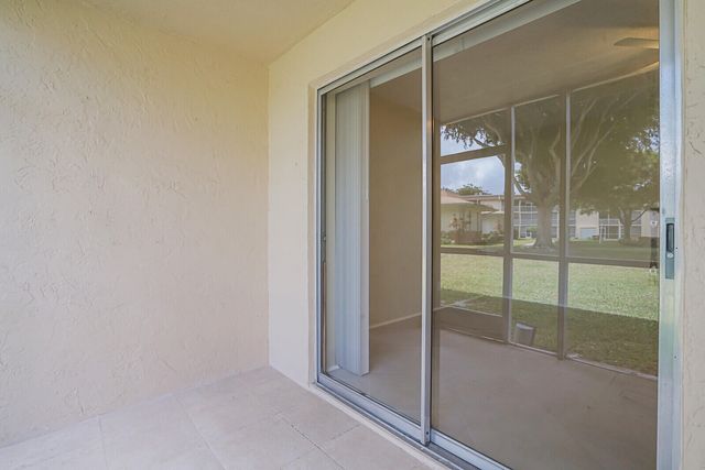 400 VILLAGE GREEN Circle W 105, Palm Springs, FL 33461