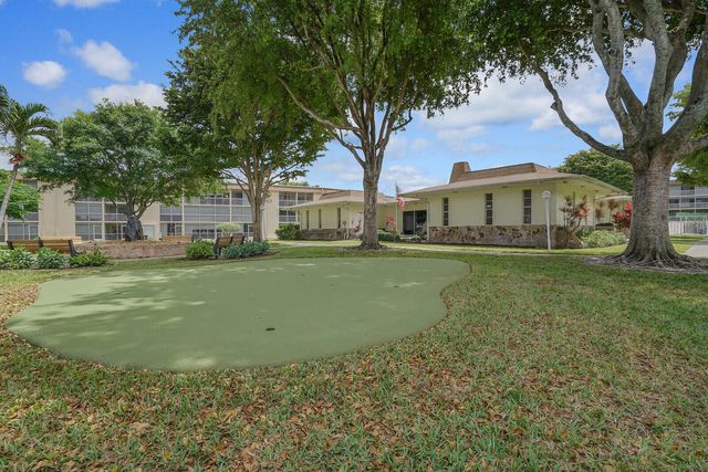 400 VILLAGE GREEN Circle W 105, Palm Springs, FL 33461