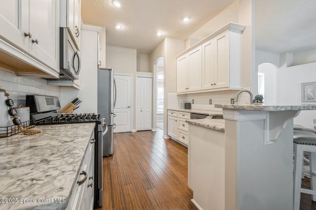 8018 Kingswood Way, Melbourne, FL 32940