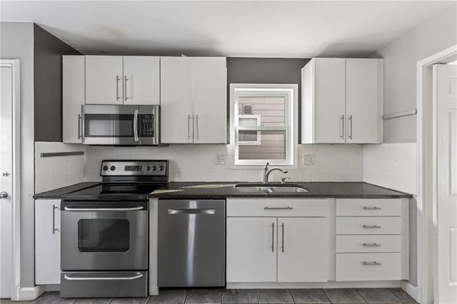 1124 W 77TH Street, Kansas City, MO 64114