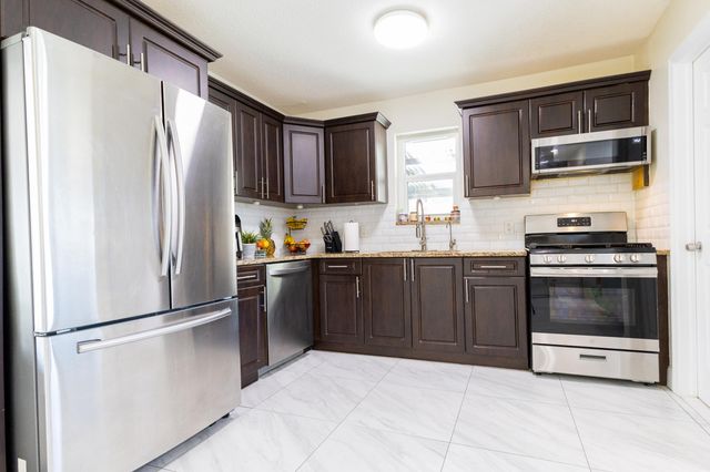 5763 Purdy Lane, West Palm Beach, FL 33415