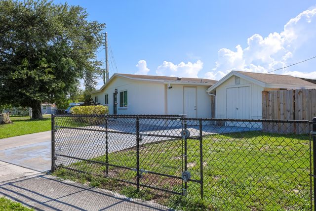 5763 Purdy Lane, West Palm Beach, FL 33415