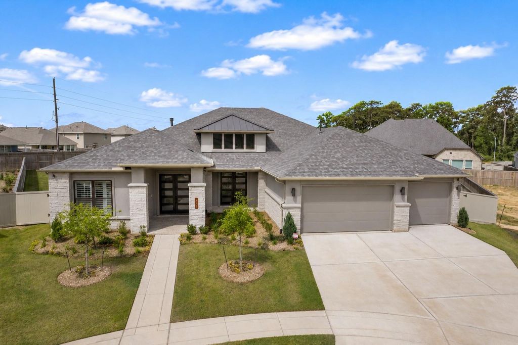 410 Arctic Warbler Court, Magnolia, TX 77354