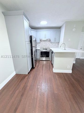 741 Lyons Rd 17108, Coconut Creek, FL 33063