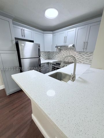 741 Lyons Rd 17108, Coconut Creek, FL 33063