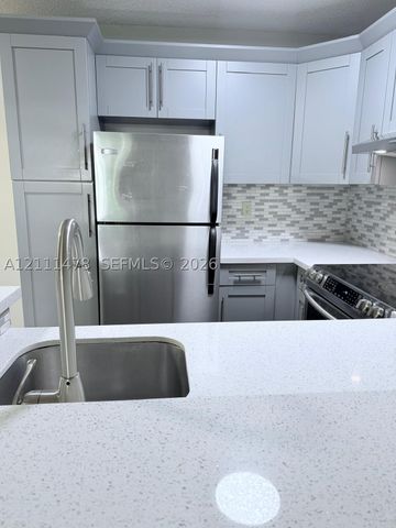 741 Lyons Rd 17108, Coconut Creek, FL 33063