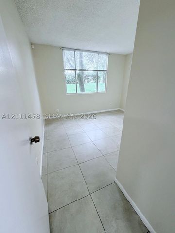 741 Lyons Rd 17108, Coconut Creek, FL 33063