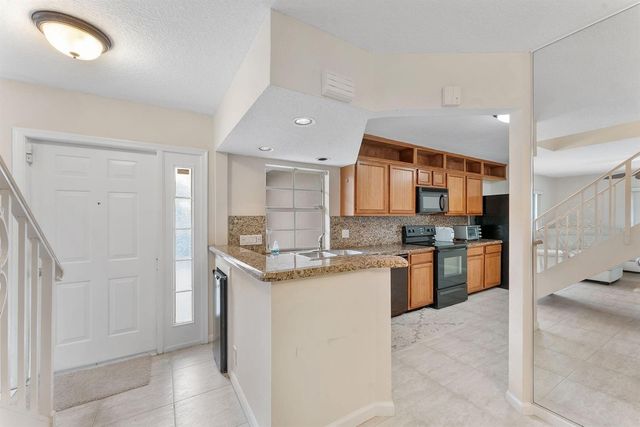 2704 Vision Drive, Palm Beach Gardens, FL 33418