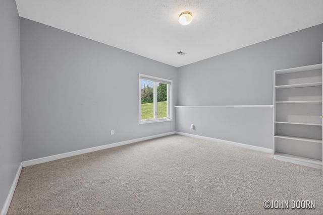 57 Rollingbrook Drive NE, Ada, MI 49301