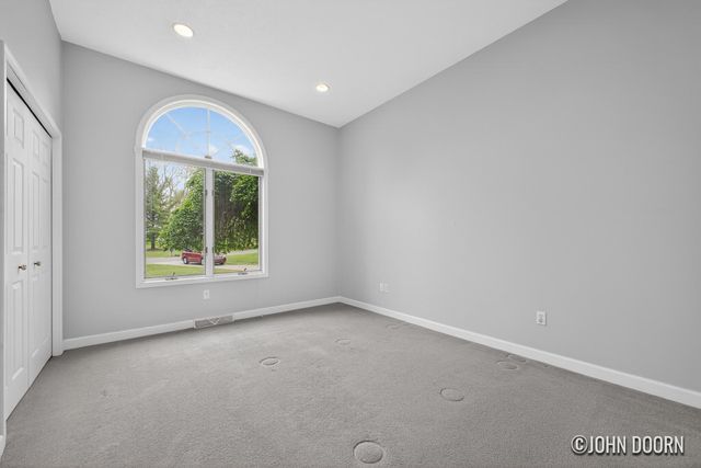 57 Rollingbrook Drive NE, Ada, MI 49301