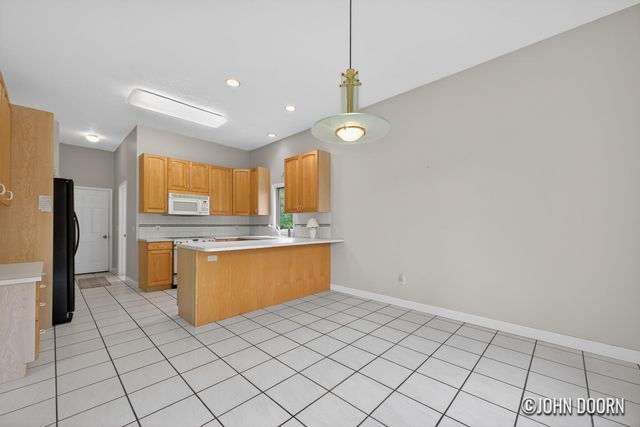57 Rollingbrook Drive NE, Ada, MI 49301
