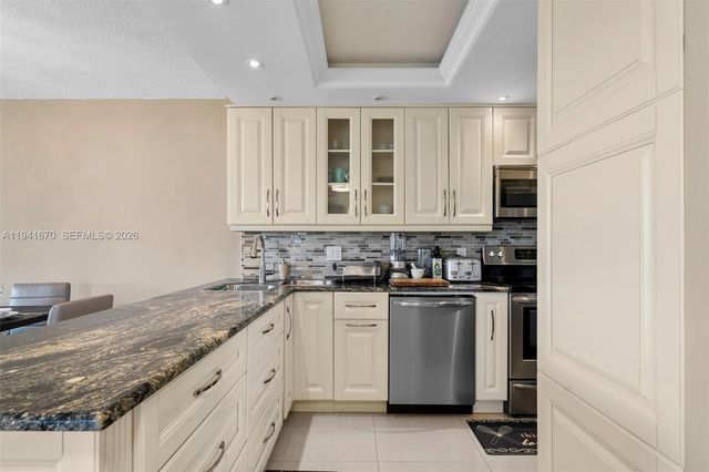 4030 W Palm Aire Drive 408, Pompano Beach, FL 33069
