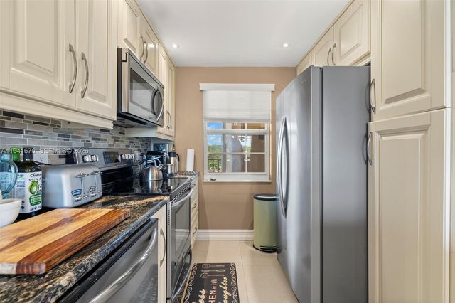4030 W Palm Aire Drive 408, Pompano Beach, FL 33069