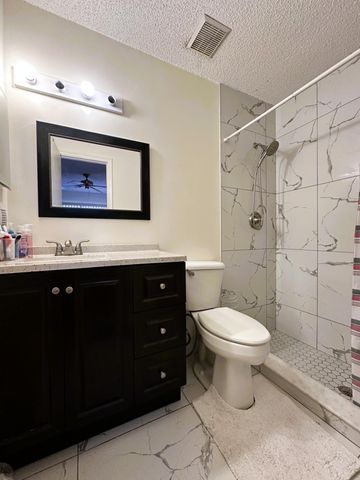 1040 PARKSIDE GREEN Drive C, Greenacres, FL 33415