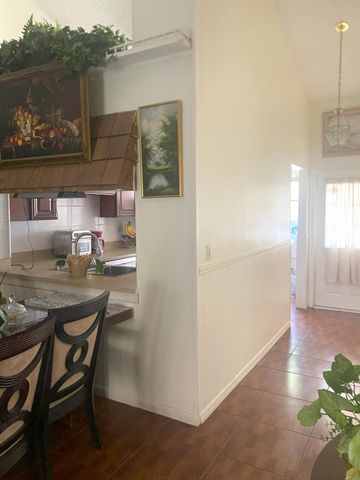 1040 PARKSIDE GREEN Drive C, Greenacres, FL 33415