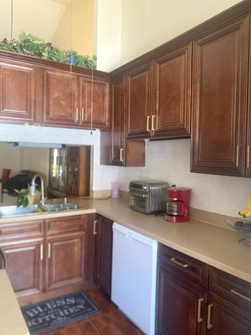 1040 PARKSIDE GREEN Drive C, Greenacres, FL 33415