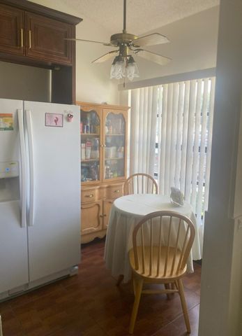 1040 PARKSIDE GREEN Drive C, Greenacres, FL 33415