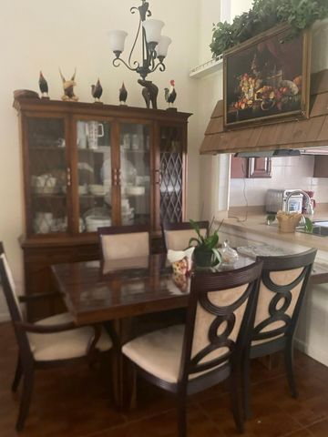 1040 PARKSIDE GREEN Drive C, Greenacres, FL 33415